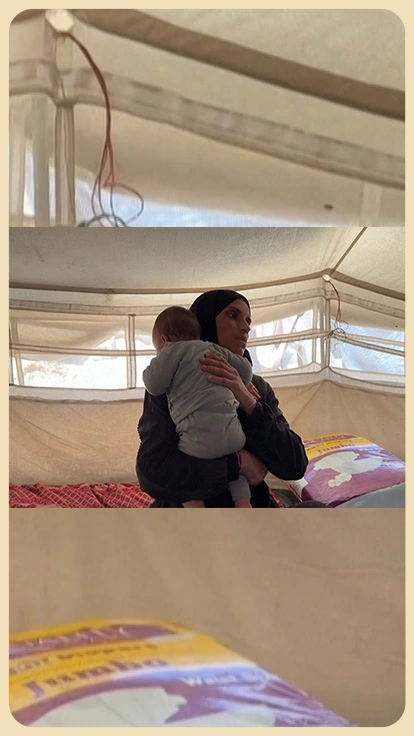Madre palestina con su bebé.