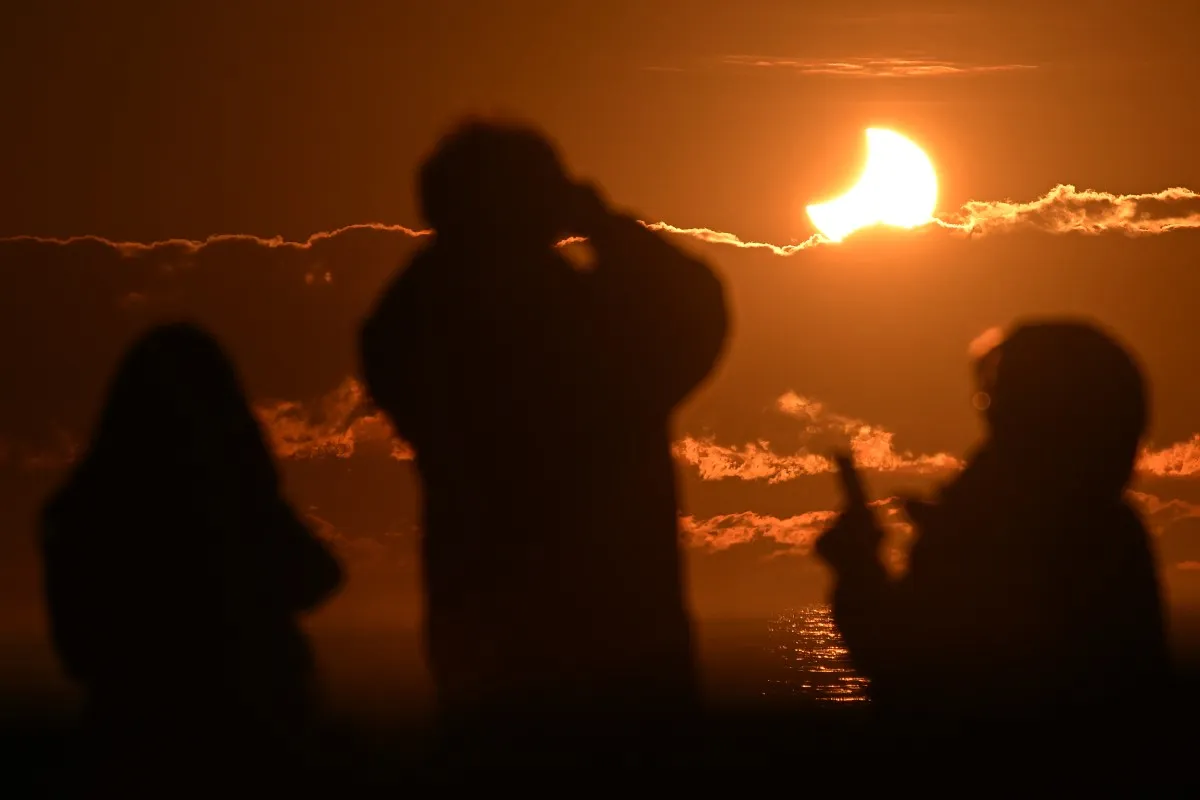 Expectadores de eclipse solar